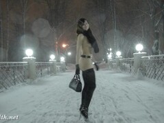 Jeny Smith naked in snow fall walking through the city Thumb