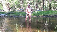 Naked bathing in the creek. Thumb