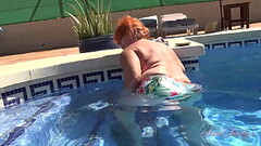 AuntJudys - Busty Mature Redhead Melanie goes for a swim Thumb